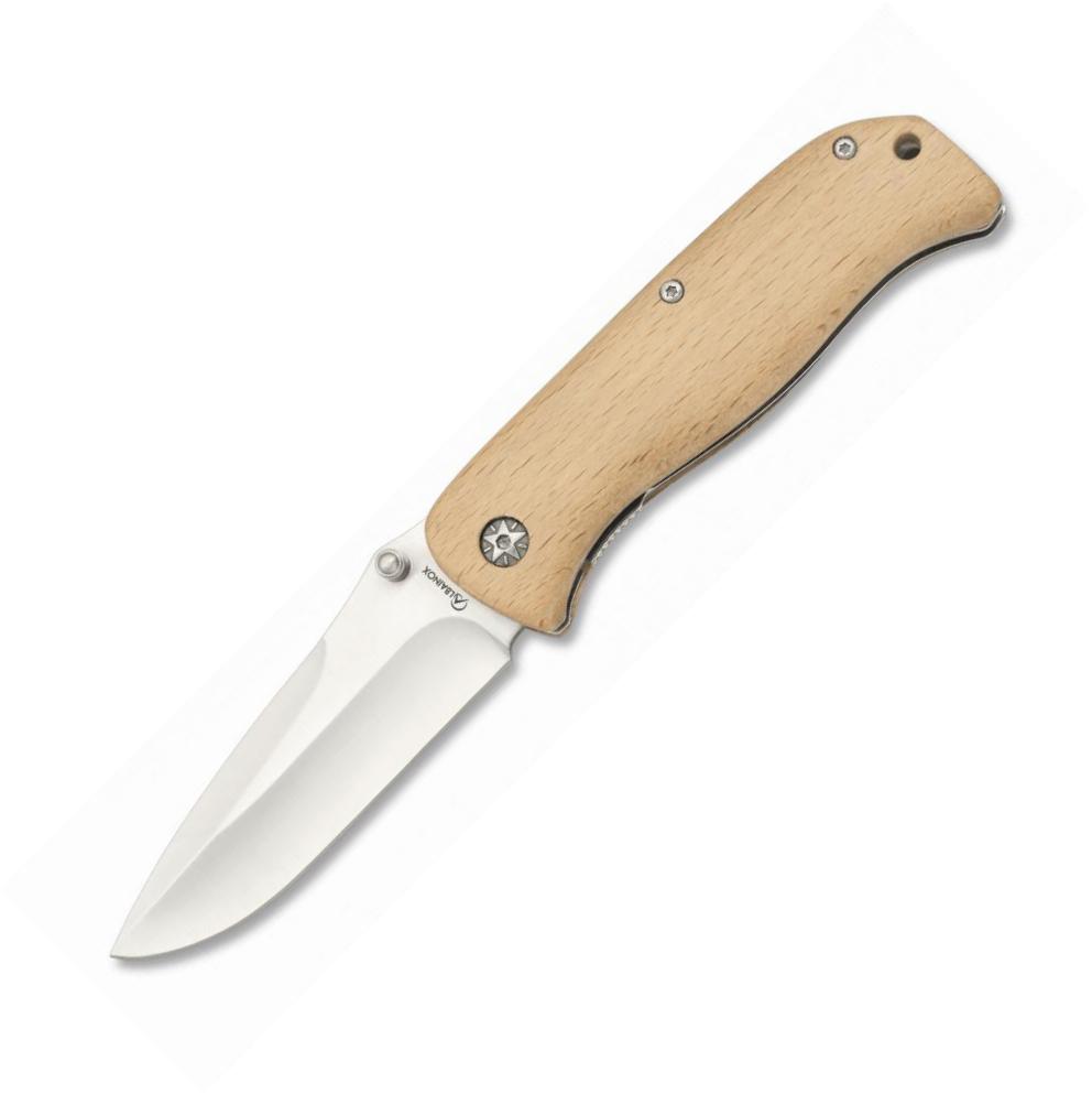 Navaja Albainox diseñada en España con mango de madera y hoja de 8,5 cm de largo con tetón