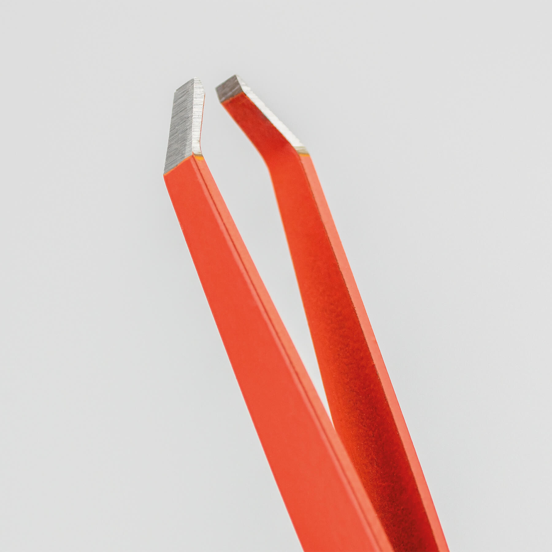 Orange tweezers with crab tip, 10 cm, 3 Claveles