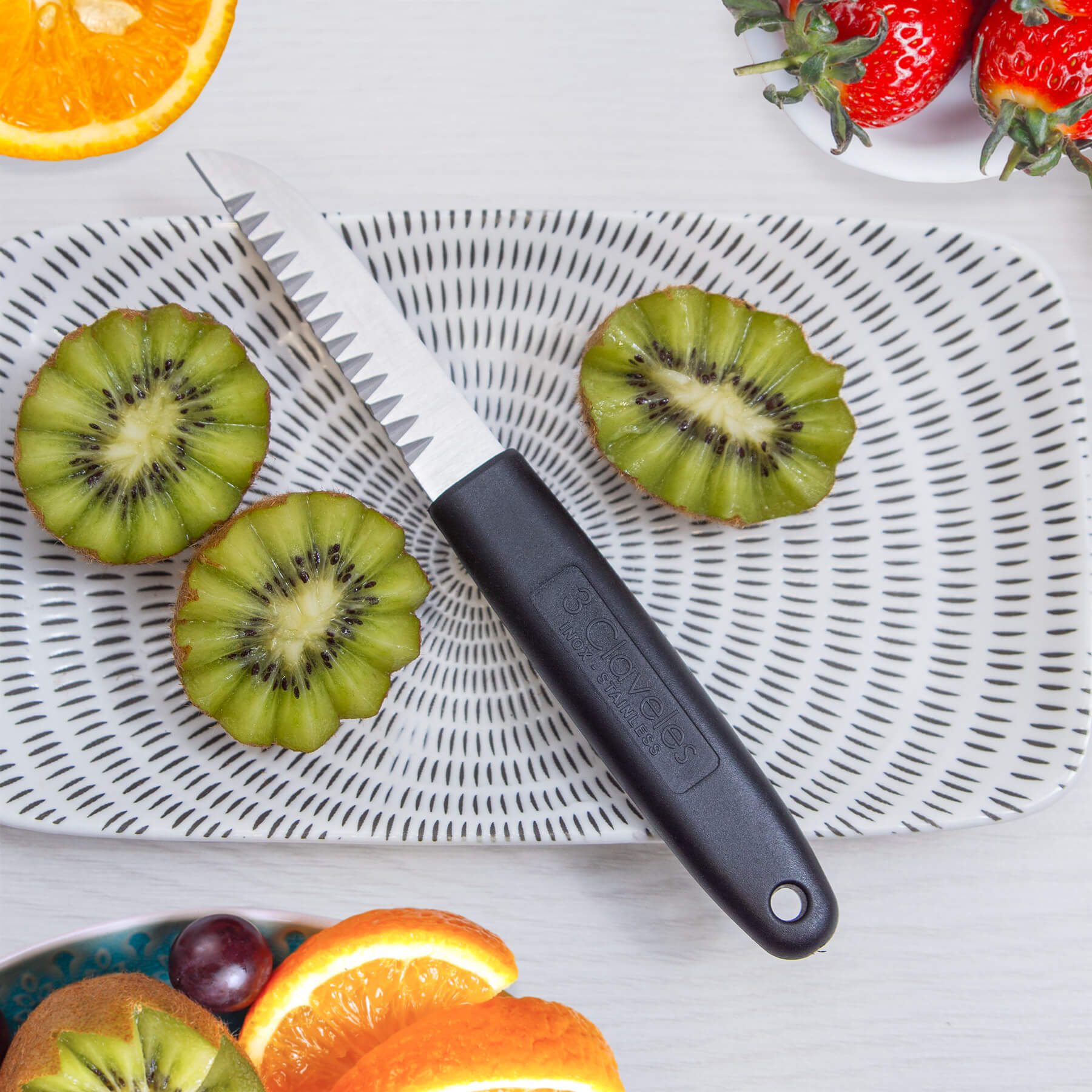 Decorating knife with black polypropylene handle, 19.5 cm, 3 Claveles