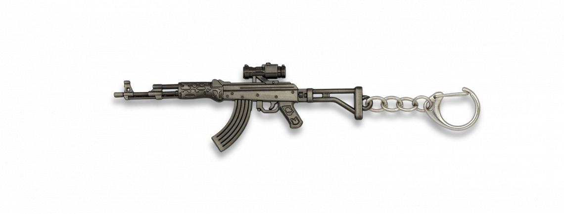 chaveiro em forma de arma de 10,5 cm de comprimento