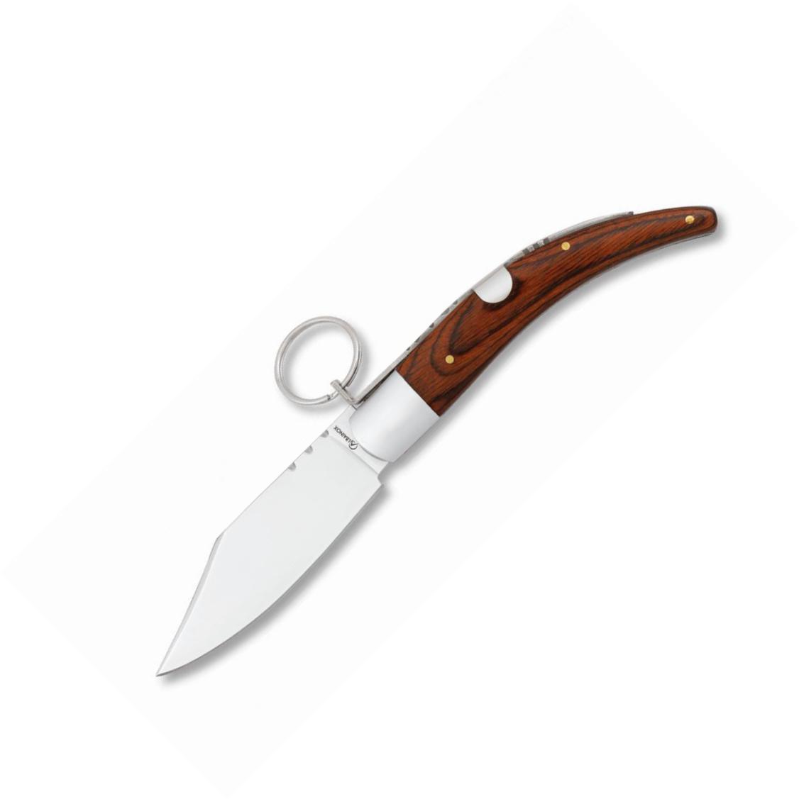 Classic folding knife with a wide blade and ring lock. Red stamin...