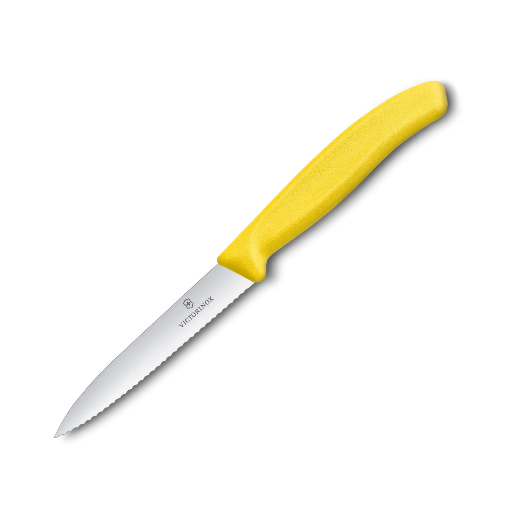 Couteau à légumes Victorinox manche jaune avec bord dentelé et po...