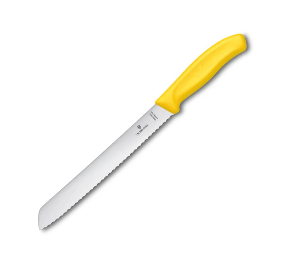 Couteau à pain Victorinox manche jaune avec lame de 21 cm et bord...