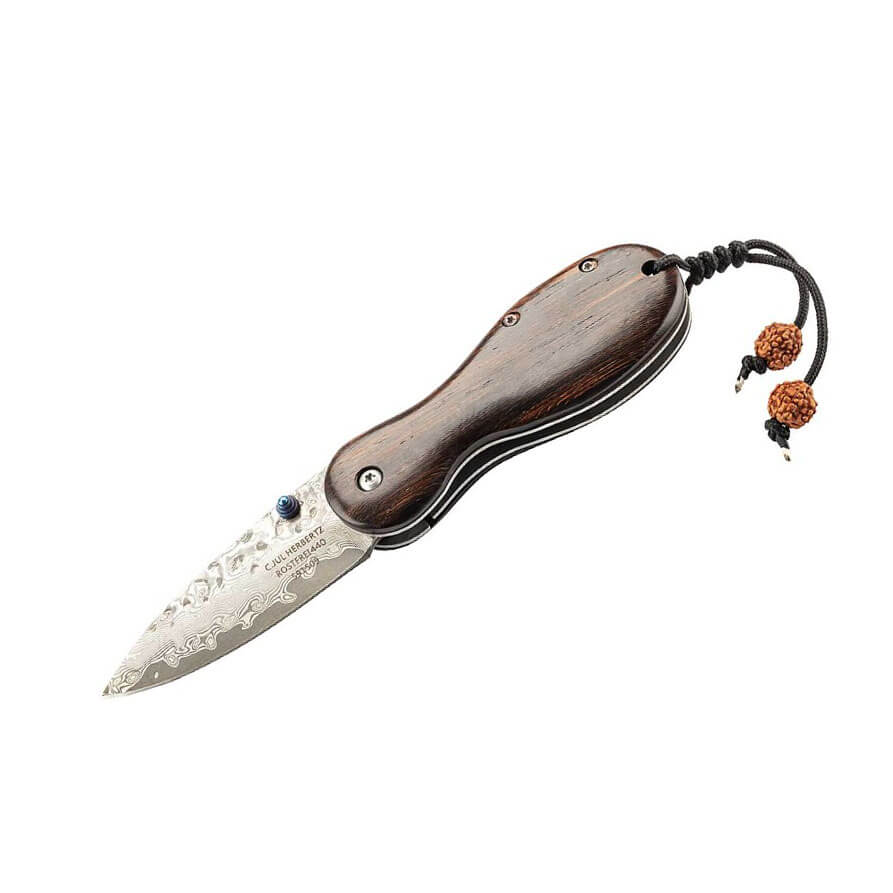 Pocket knife with Tagayasan wood handle and 6.5 cm Damascus steel...