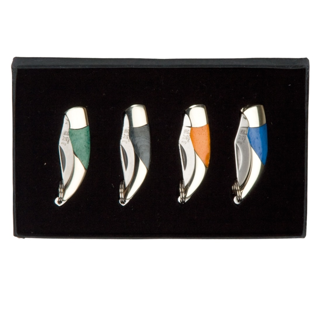 Set of 4 JKR miniature knives with different colored bone handles...