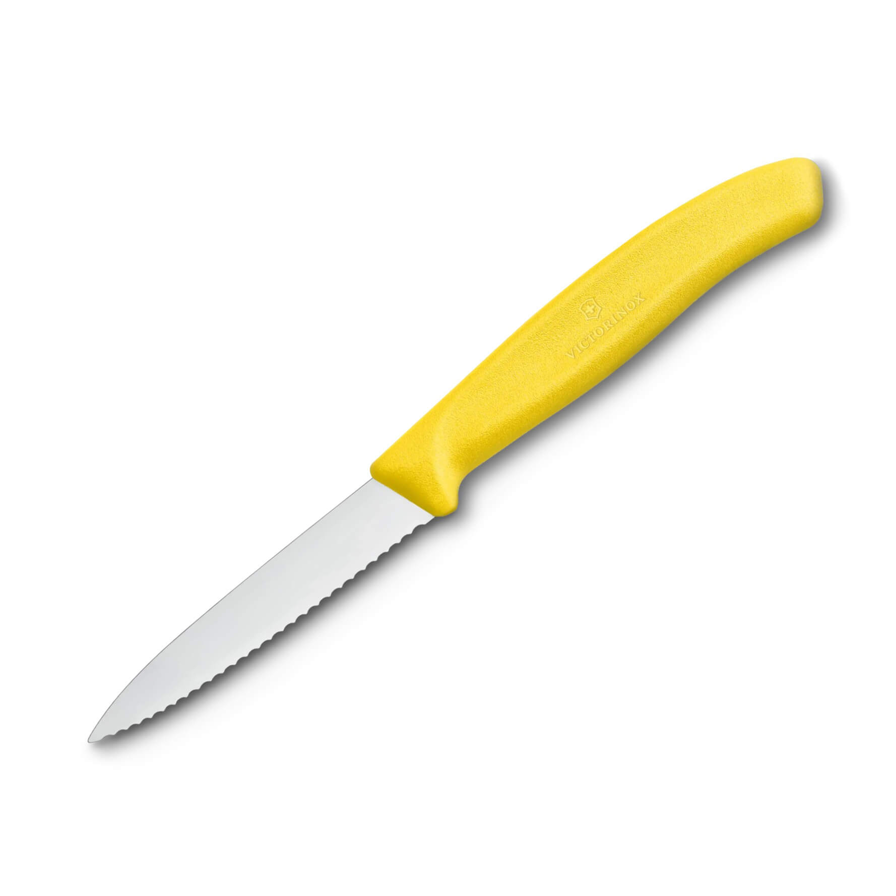 Couteau à légumes Victorinox manche jaune avec bord dentelé et po...